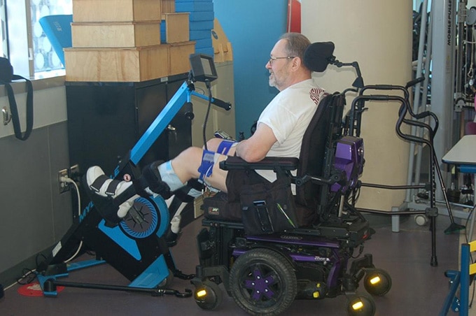 A participant using the MyoCycle